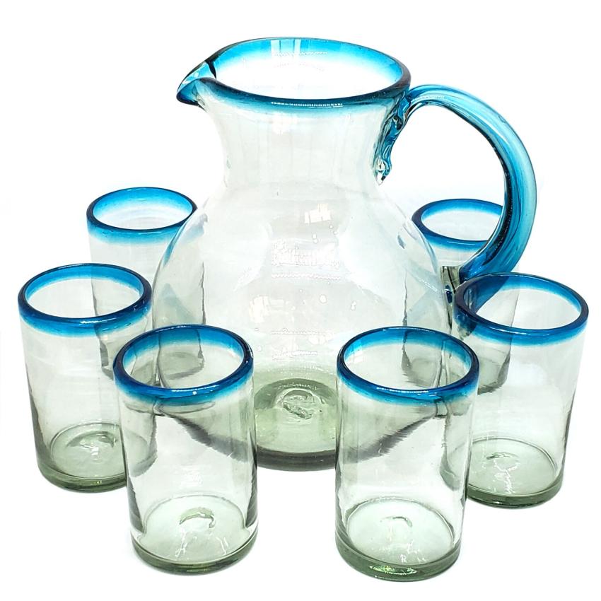 Novedades / Juego de jarra y 6 vasos grandes con borde azul aqua / Transpórtese al mar caribe con éste bello juego de jarra y vasos con borde azul aqua.